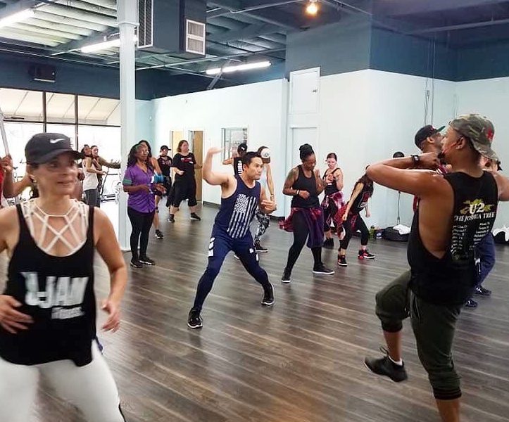 room full of dancers dancing