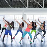 people in bright colors dancing bollywood