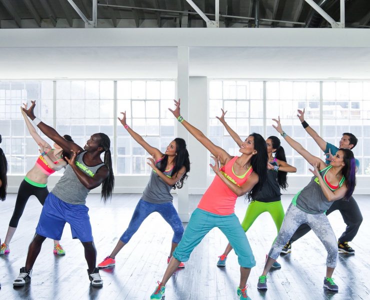 people in bright colors dancing bollywood